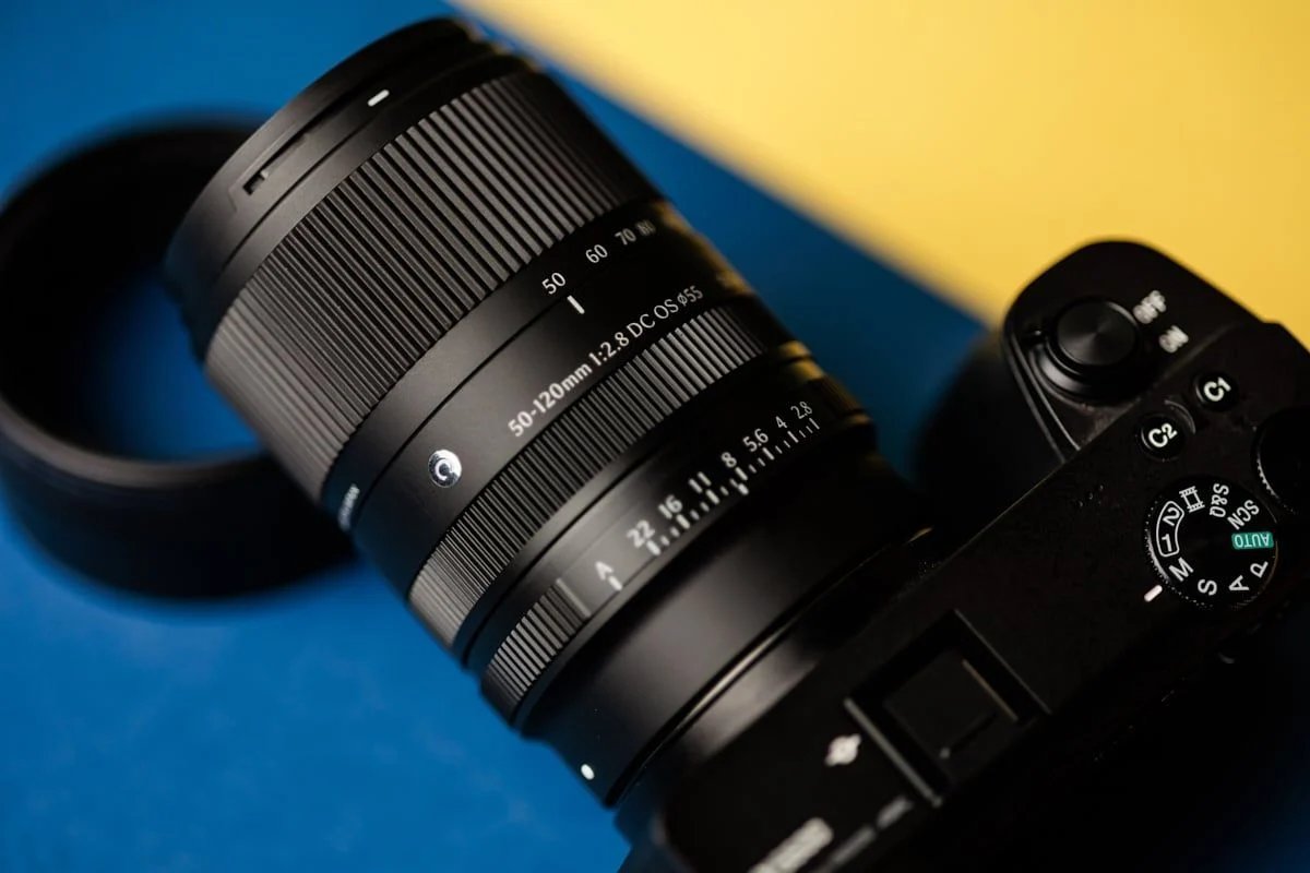 Leaked photo of a Sigma 50-120mm F2.8 DC OS lens mounted on a camera